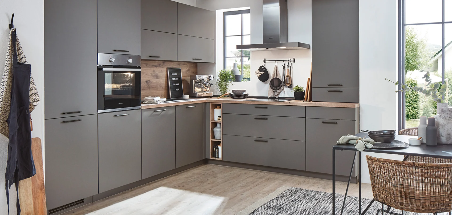 Contemporary dark grey kitchen with smart storage by 21 Kitchens Ayrshire