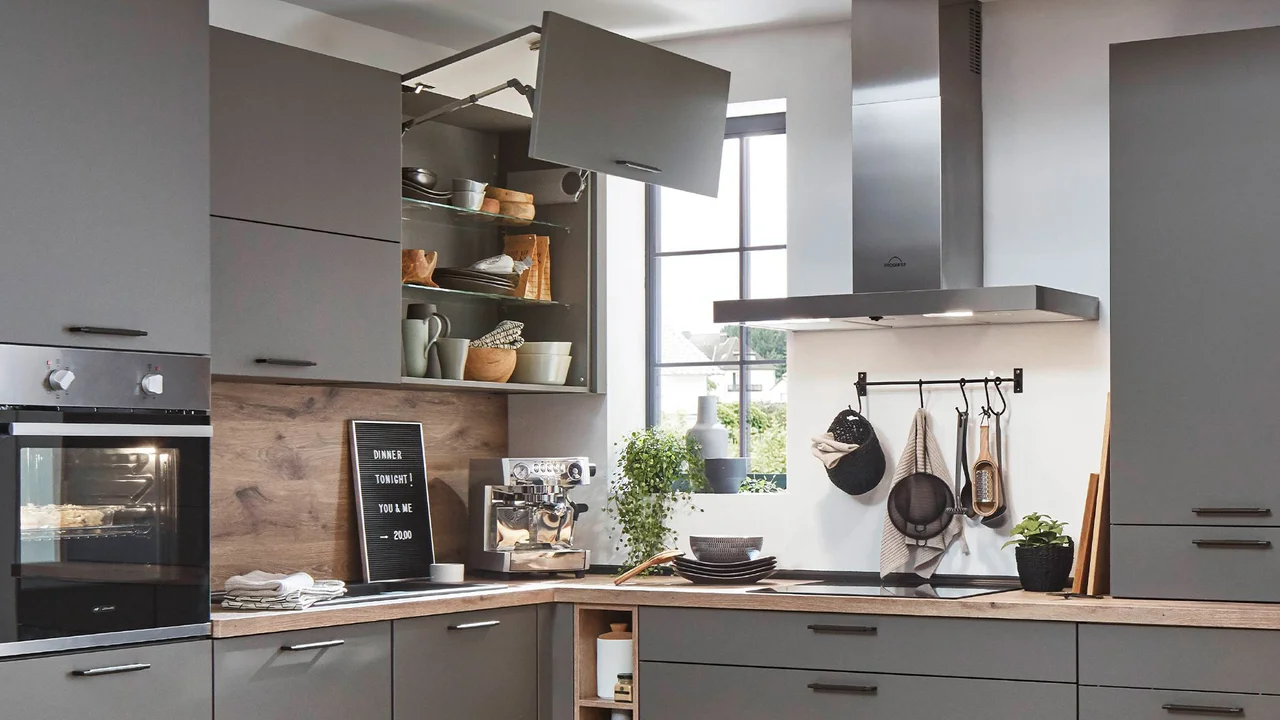 Modern German kitchen in graphite grey with integrated storage solutions