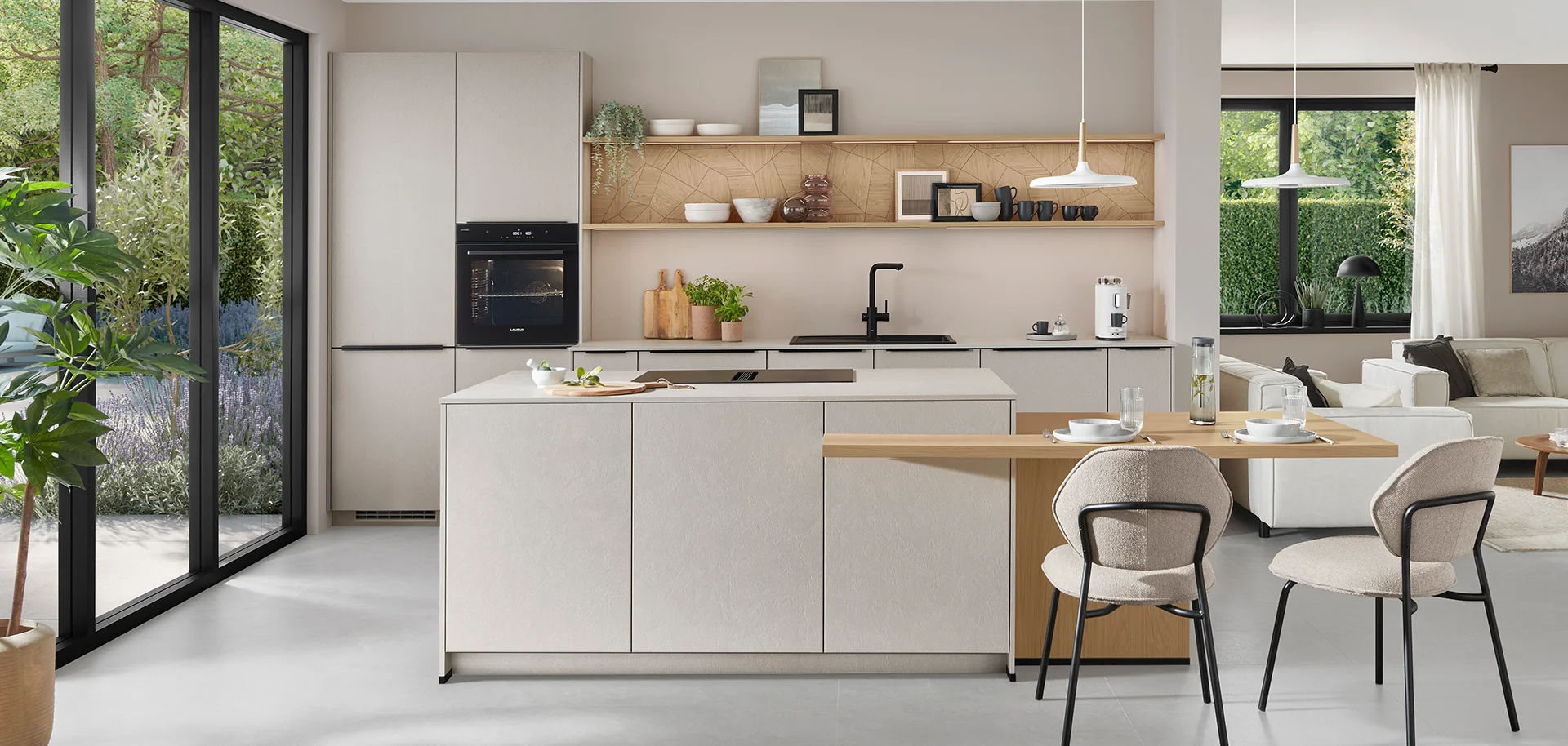 Modern sand-toned kitchen with island and dining area by 21 Kitchens Ayrshire