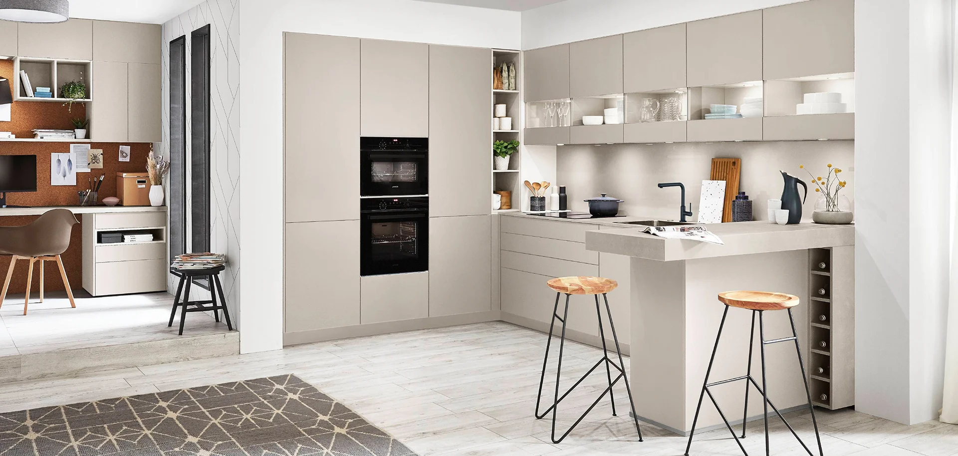 Modern U-shaped sand kitchen designed by 21 Kitchens Ayrshire
